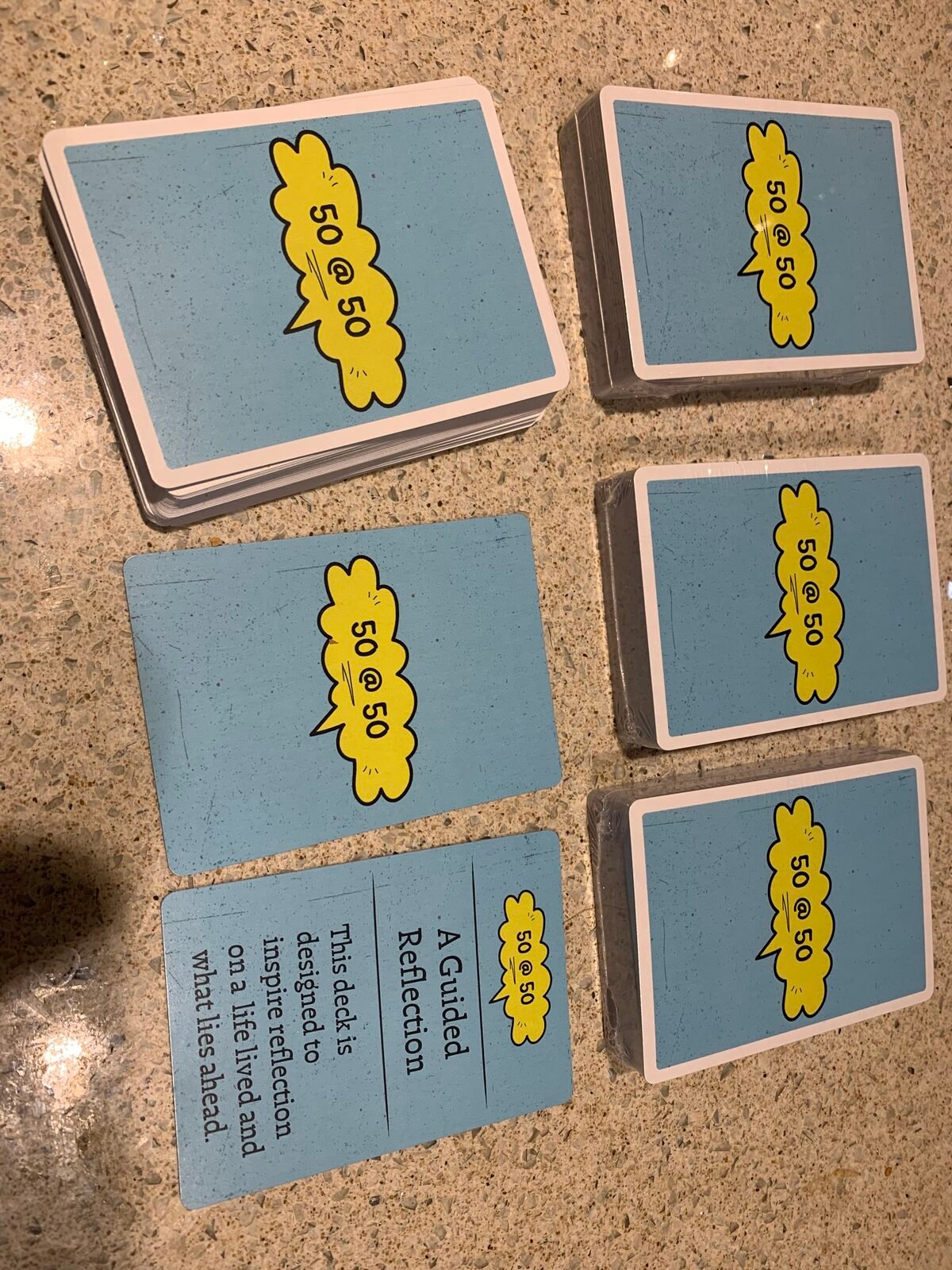 50 @ 50 decks with the introduction card